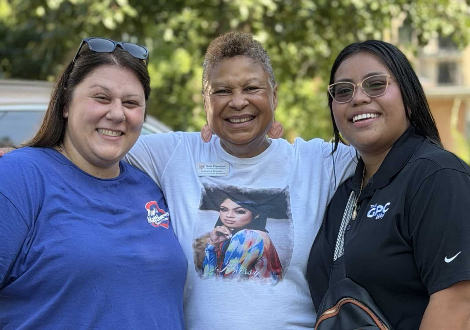 Stephanie Turco, Pat Richardson, and Kathia Luna at the backpack drive